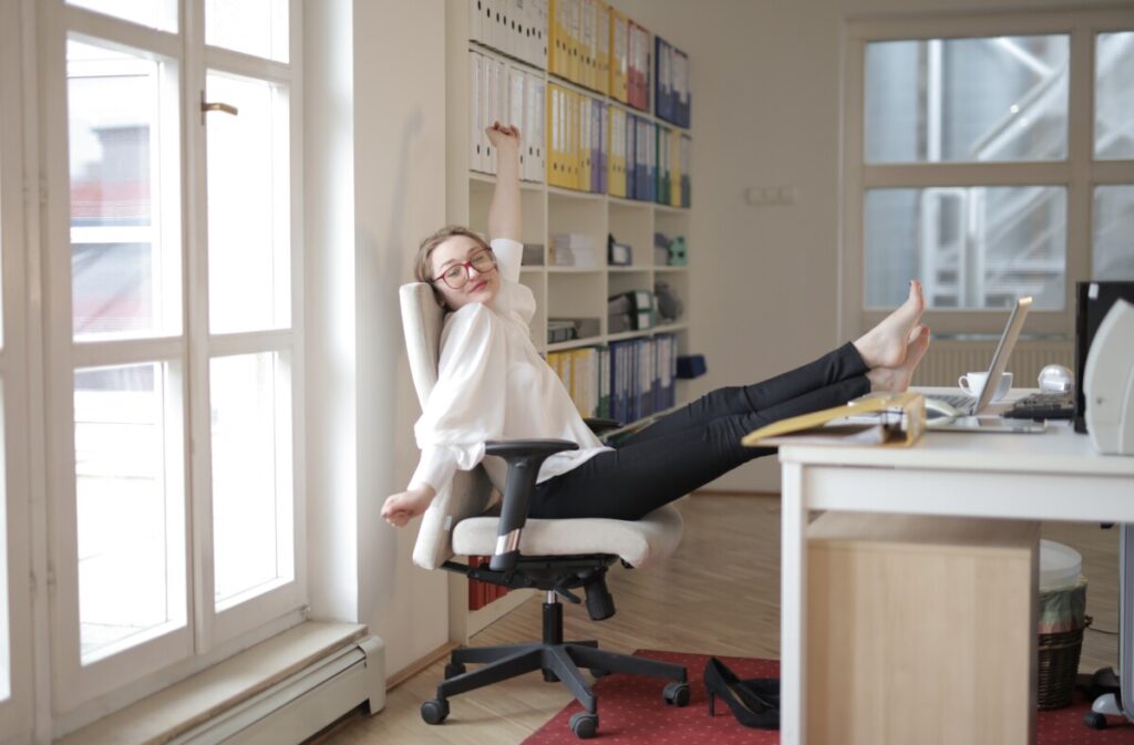 Employee benefiting from a wellness program, illustrating the connection between health and business success.