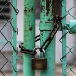 green fence is on lock